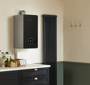 Modern energy-efficient boiler installed in a stylish UK home kitchen – sleek design with digital controls for smart heating.